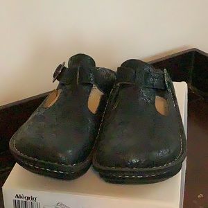 Algeria clogs.  Adjustable top strap.  Size 37. Beautiful black suede.